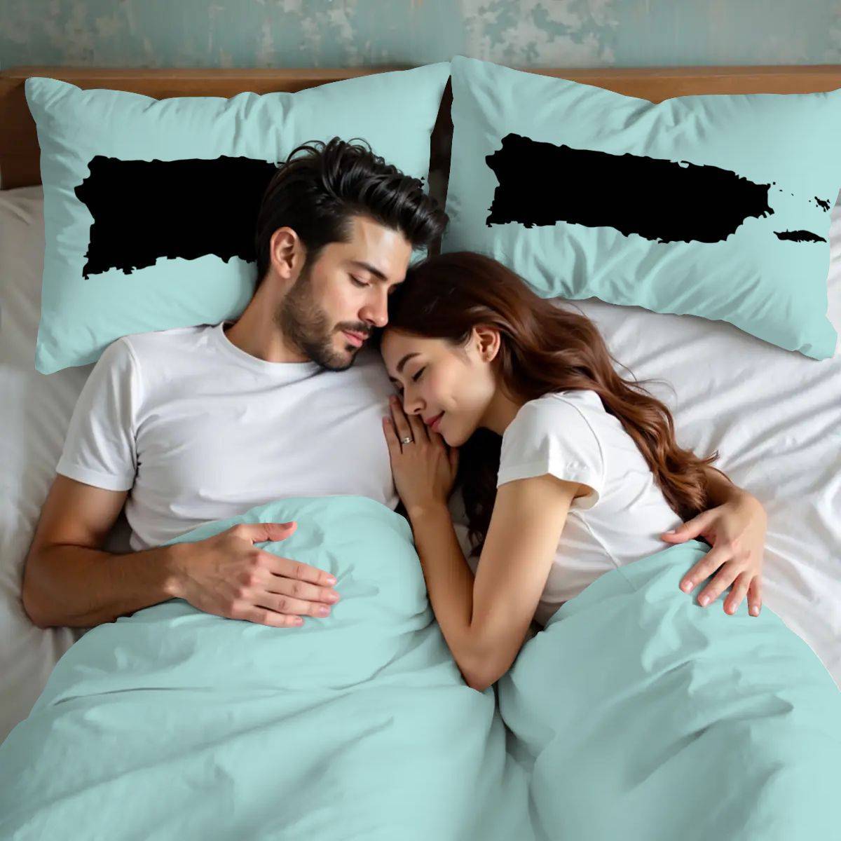 Couple sleeping under Puerto Rico queen duvet cover with PFKNR print and map pillowcases. Soft and romantic bedroom gift idea.
